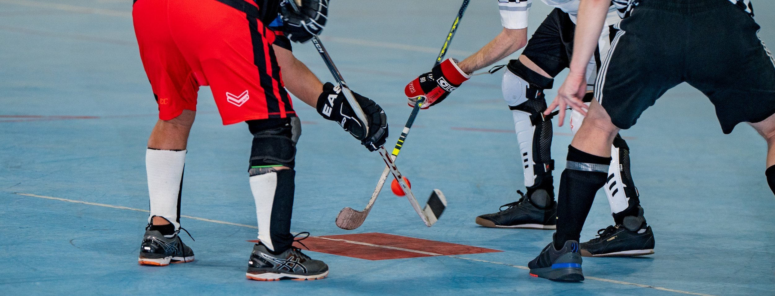 Ball hockey action at Ellenberger Park